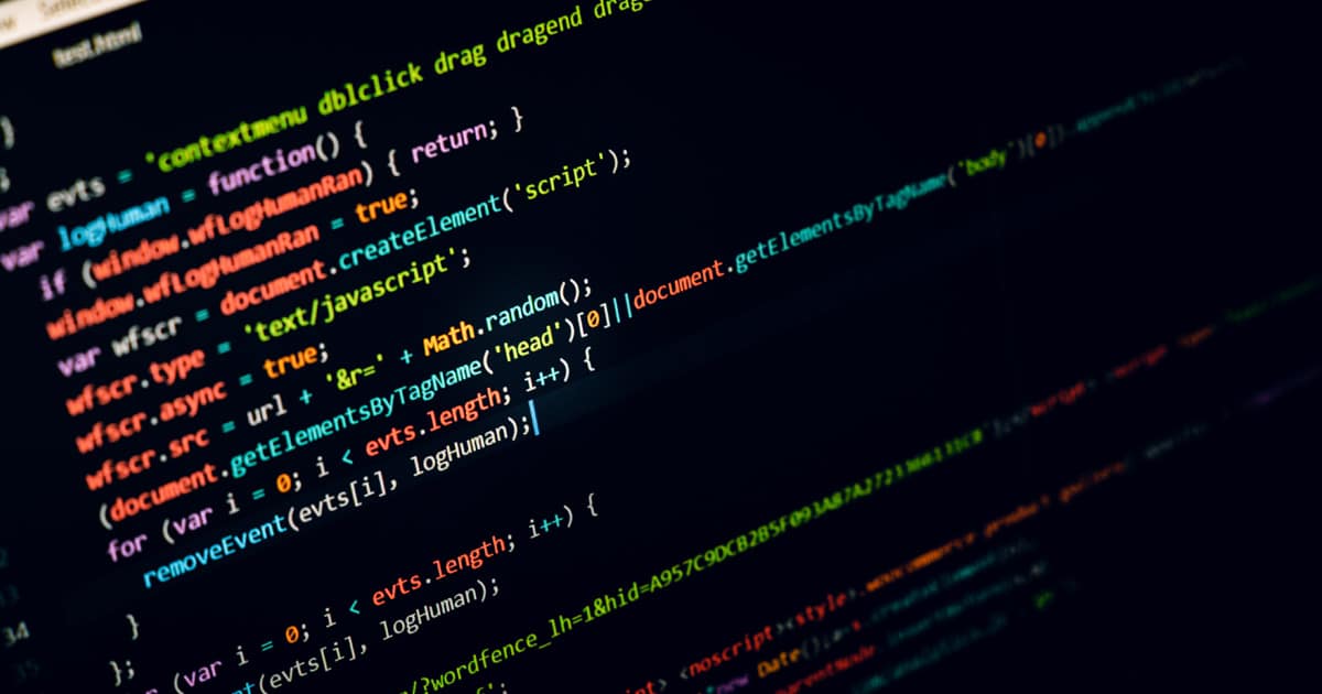 Code on a screen, illustrating how to choose a website feedback tool